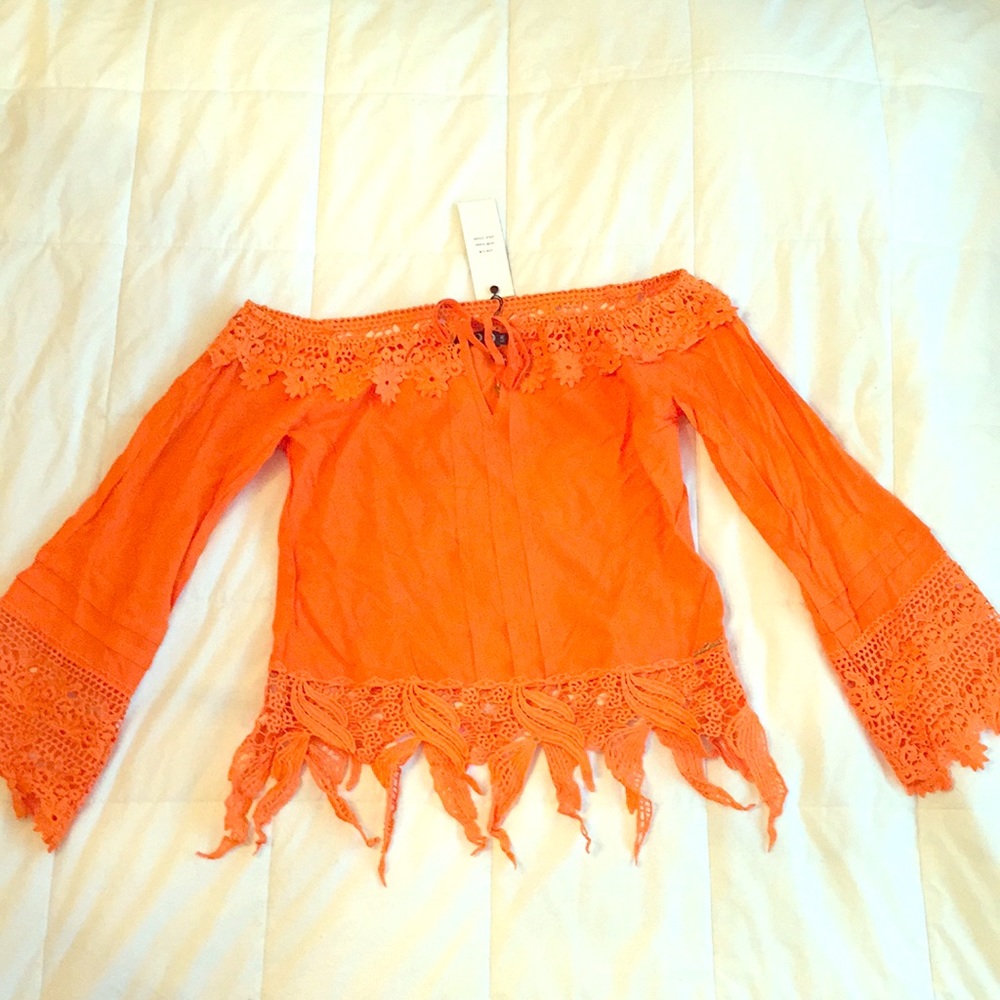 BRAND NEW! Orange top with funky detail!